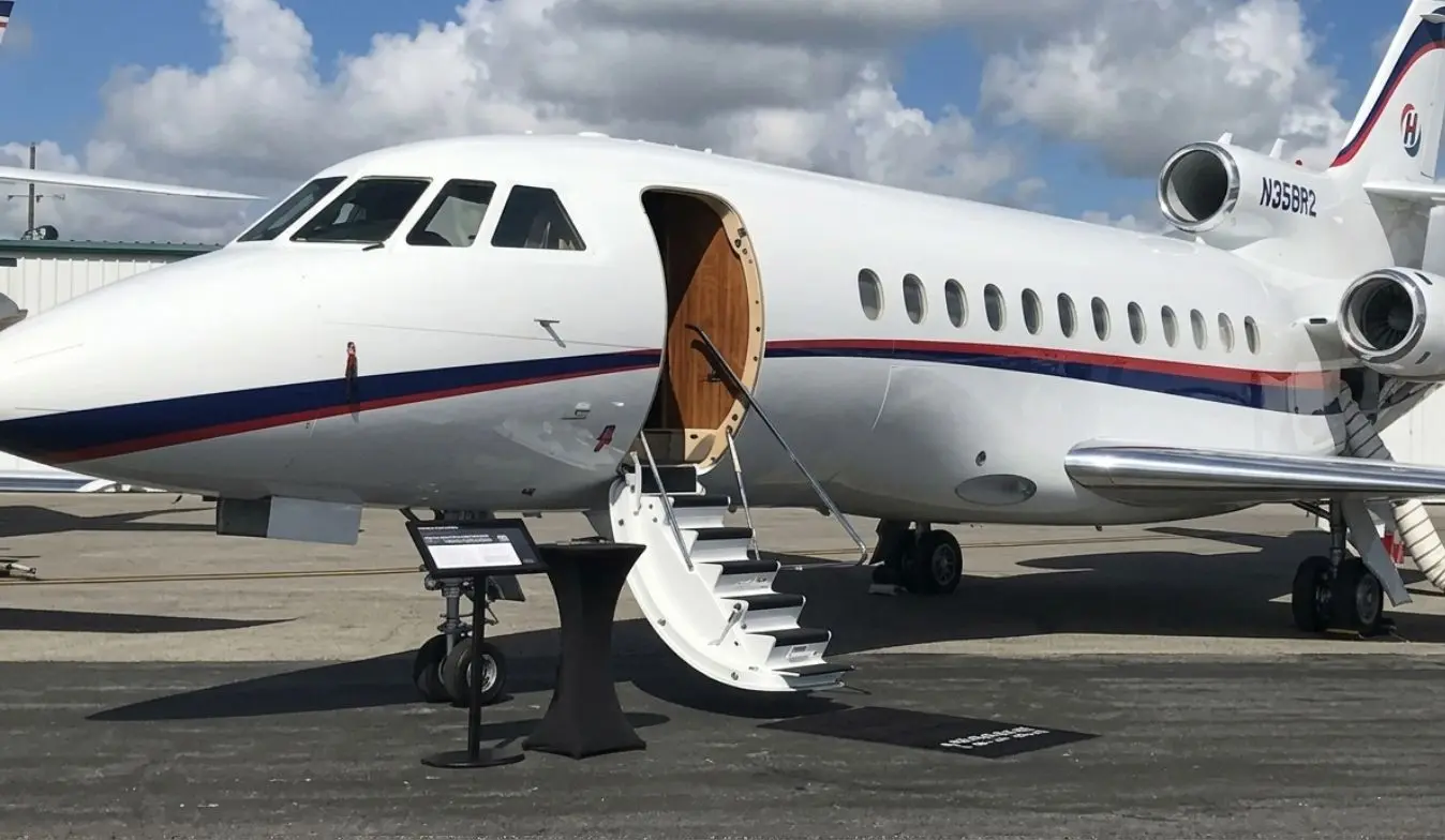 Commercial airplane on the tarmac at Jomo Kenyatta International Airport (JKIA) terminal - Huute Travel and Cargo flight ticketing, visa processing, and global freight logistics services in Nairobi Kenya