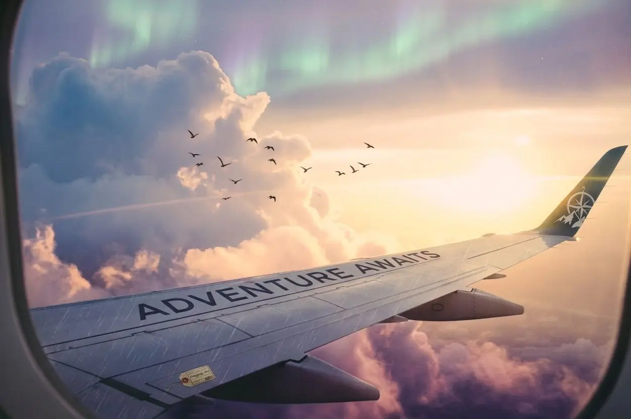 Huute Travel airplane flying over clouds - affordable flight booking and international cargo logistics services in Nairobi